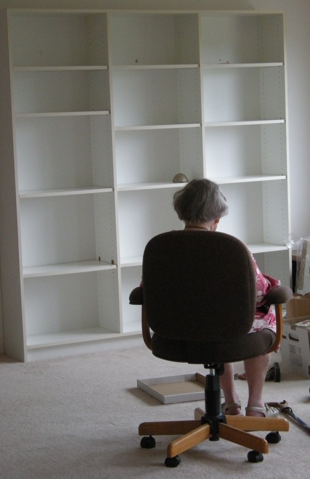 Mother facing the empty shelves